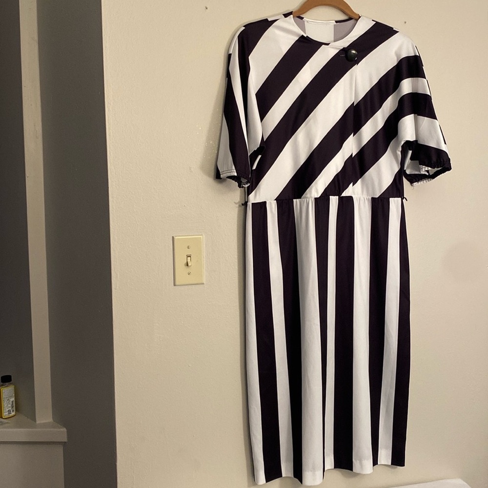 Striped dress-Size 10/12-Light weight polyester feel-belt loops.